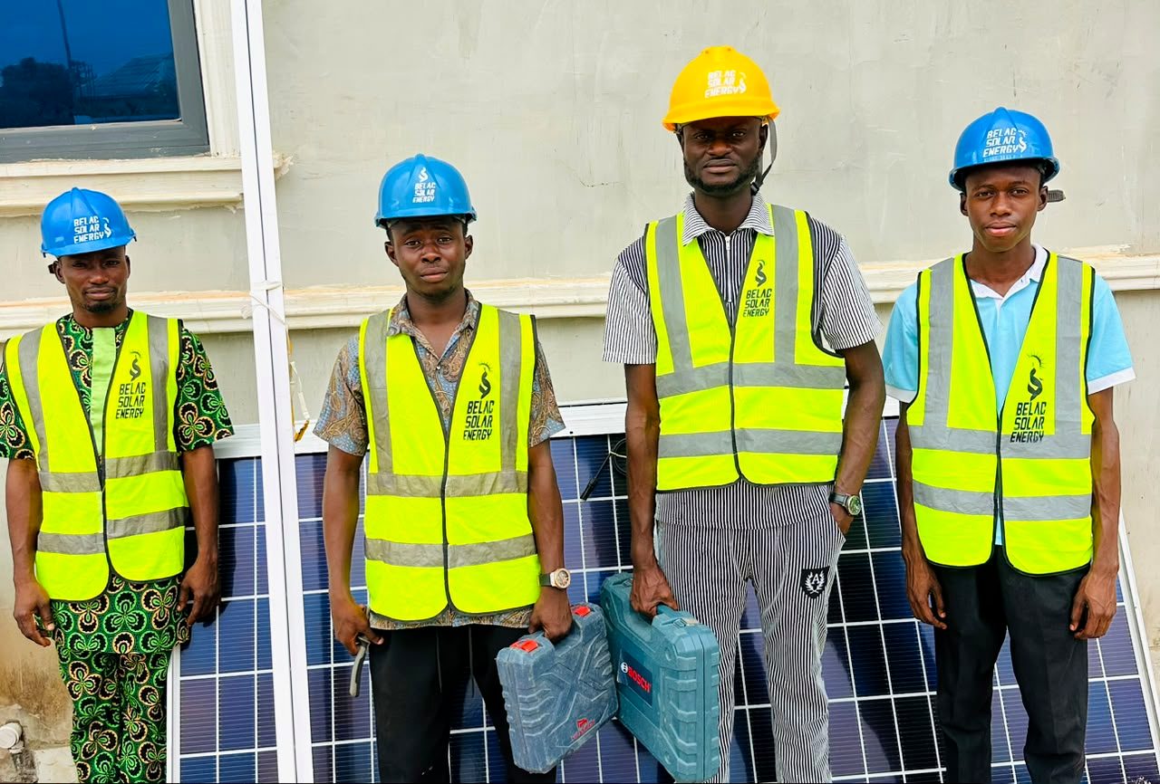 Belac Solar Energy installation team on site with solar panels